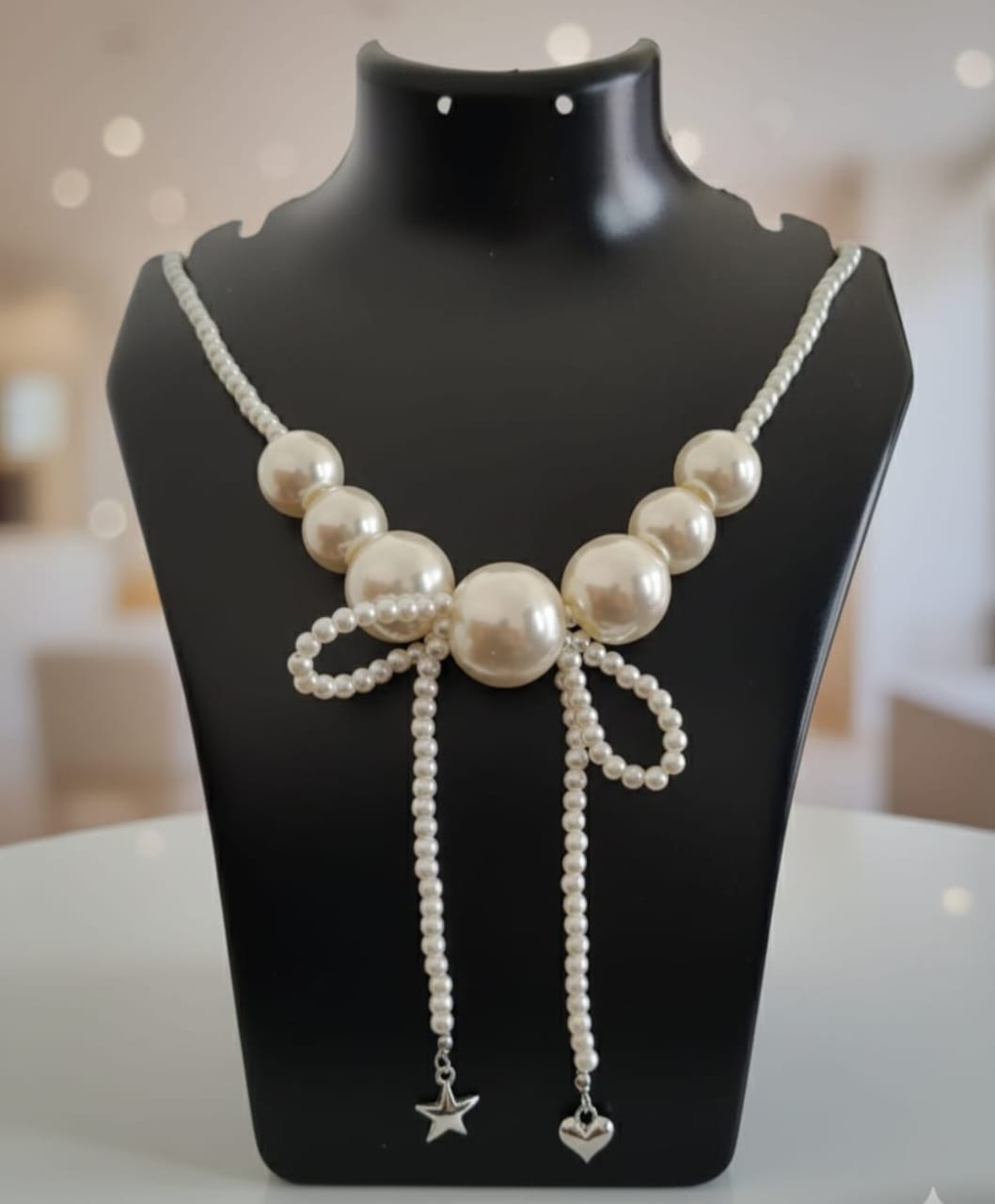 Elegant Pearl Bow Necklace with Star & Heart Charm